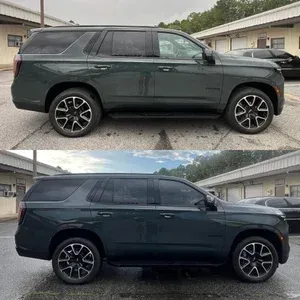 Dark green SUV shown in two side-view photos, parked outdoors near a building.