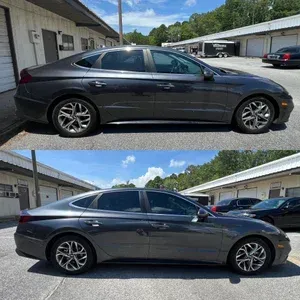 Dark gray sedan shown in two side-view photos outside a house and carport under a blue sky