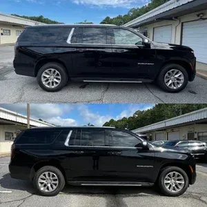 Black SUV parked in a driveway, shown from the side in two nearly identical photos.