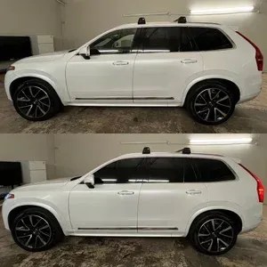 Two side-by-side photos of a white SUV in a garage, showing side profile with black rims and tinted windows