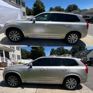 Silver SUV parked in a suburban driveway, shown in side view from two angles.