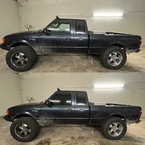 Two side-view photos of a black pickup truck in a garage, with different wheel setups.