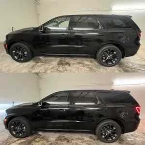 Black SUV shown in side profile, front and rear views, inside a garage.