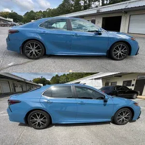 Blue sedan parked outdoors, shown from the side in two angled views.
