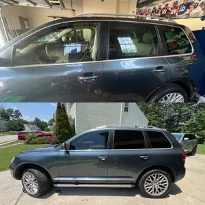 Blue SUV shown from the side in a garage and outdoors, with roof rails and silver wheels.