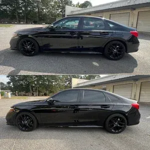 Black sedan parked beside a building, shown in two side-view angles with tinted windows and black rims