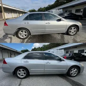 Silver sedan parked outdoors, shown in side view from two angles.