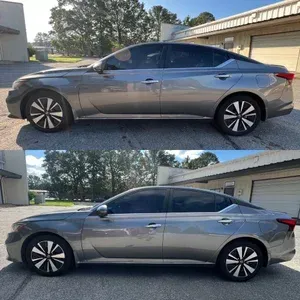 Side view of a silver sedan, shown twice, parked outdoors beside a building and garage.