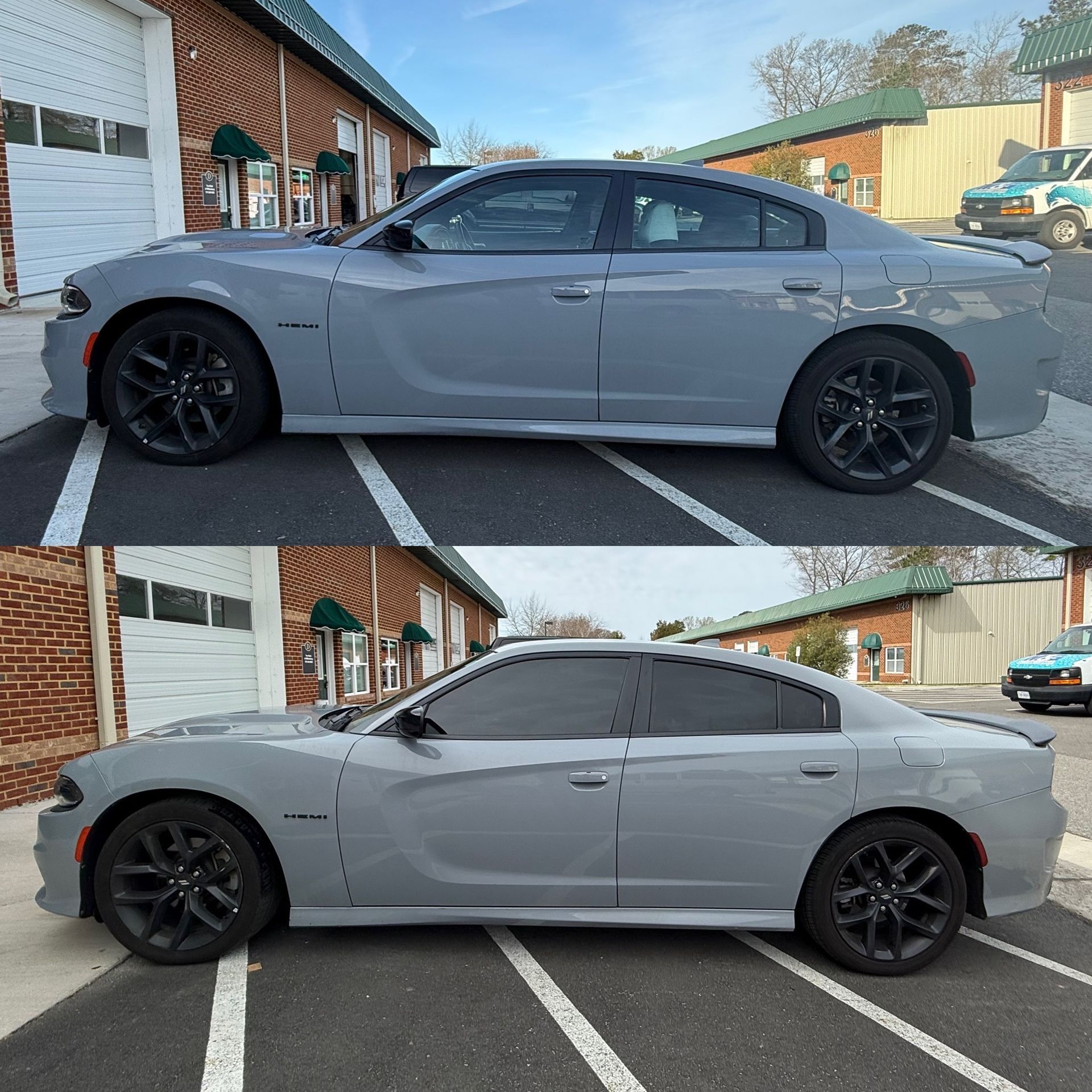 Gray sedan shown from side and rear in a parking lot, with tinted windows and black rims.