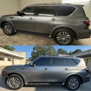 Gray SUV shown from side in two photos, parked outdoors on a driveway and in front of a building
