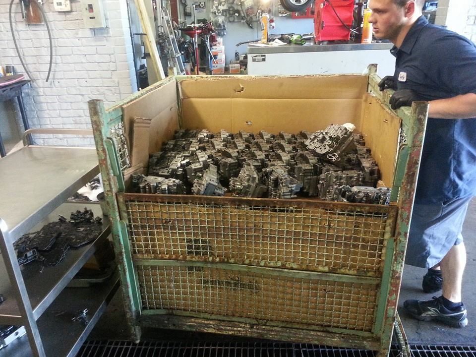 Staff holding a number of valve products