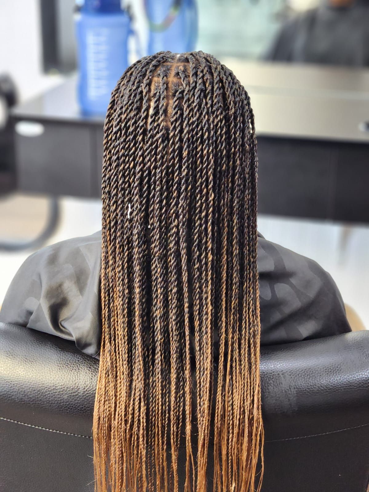 ombre black and brown hair color with braid hairstyle