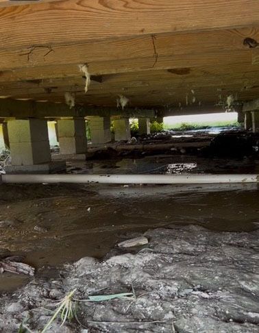 Underneath a raised house