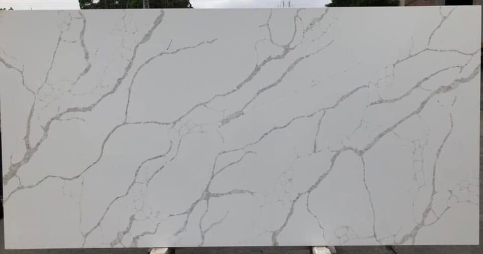 White marble-look countertop slab with gray veining