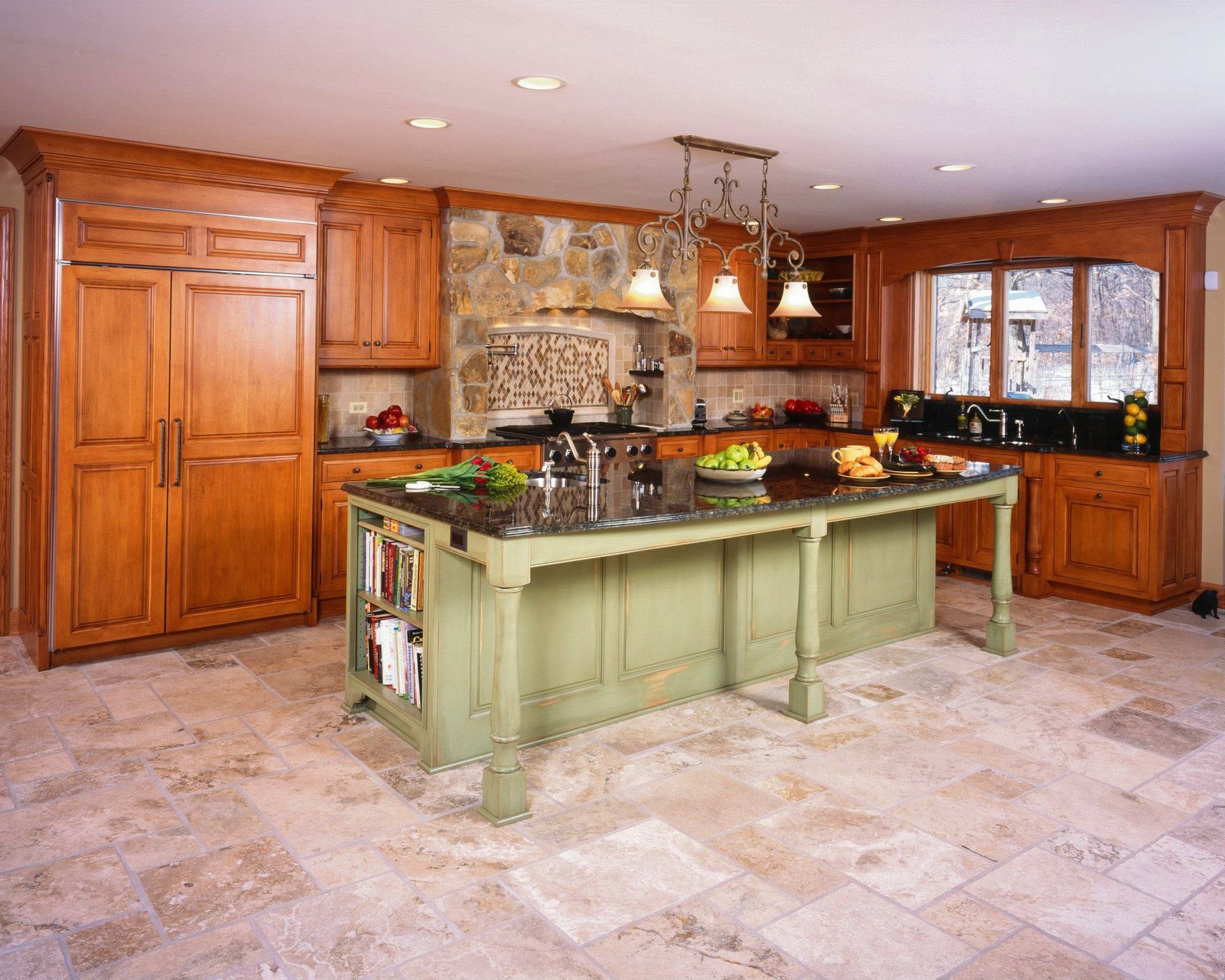 Spacious kitchen with wood cabinets, stone backsplash, large island, and tiled floor