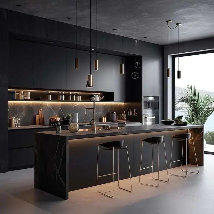 A modern, minimalist kitchen featuring dark matte cabinetry, a marble backsplash, and a central island with bar stools.