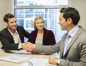 Consultant Shaking Hand With Happy Business man