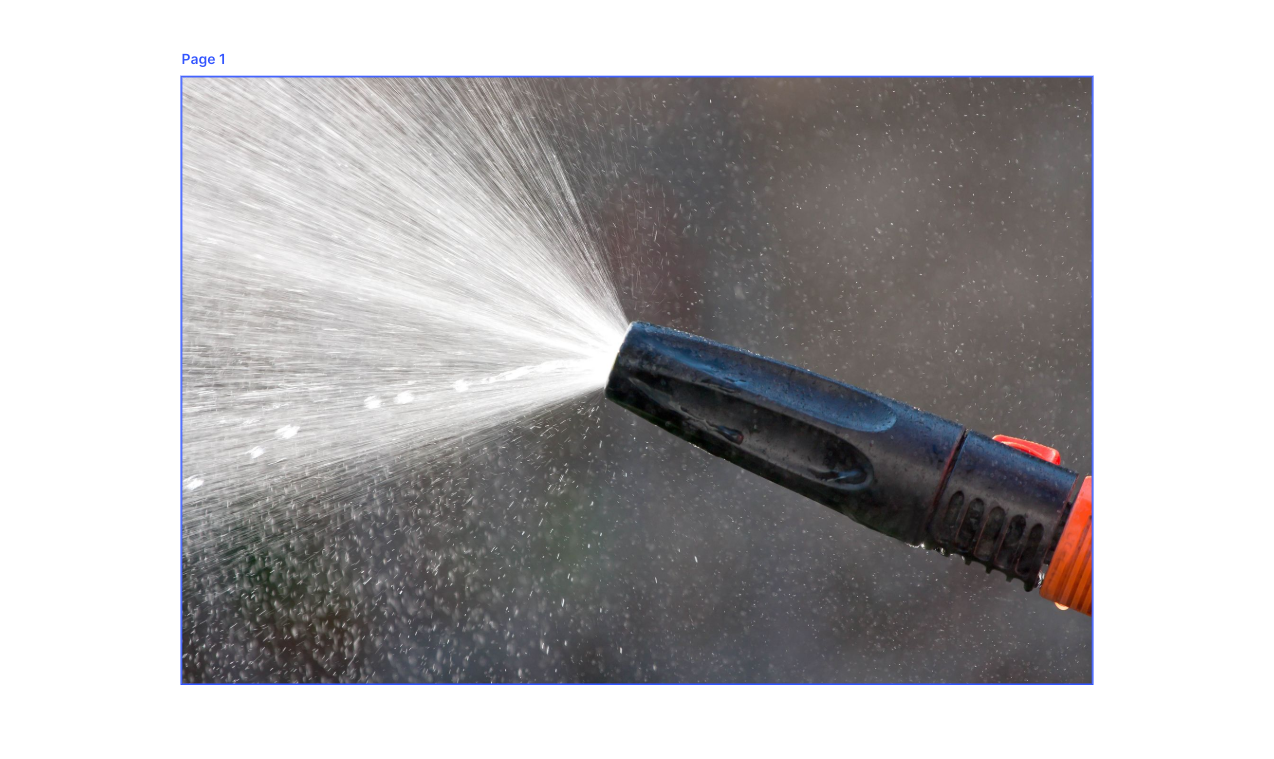 Water spraying from a black nozzle, the spray is white, dark blurred background.