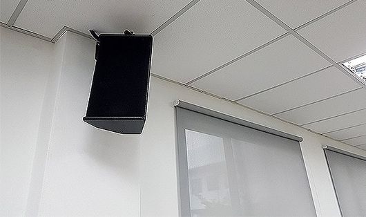 Speaker in a commercial hall