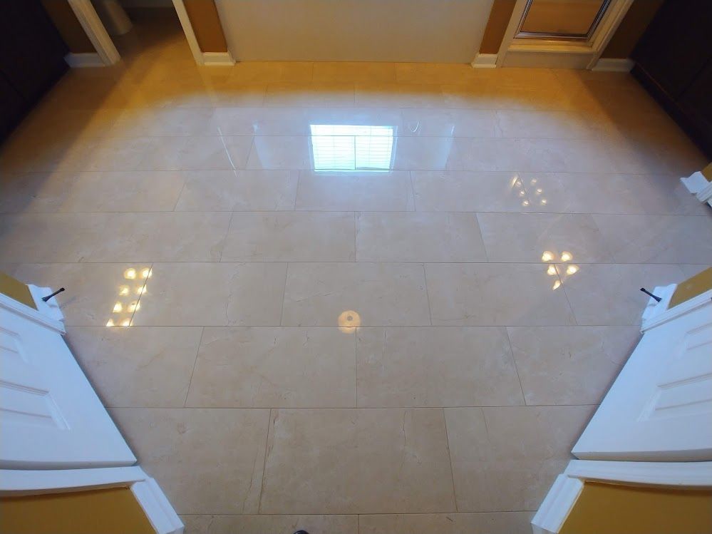 A room with a tiled floor and a window