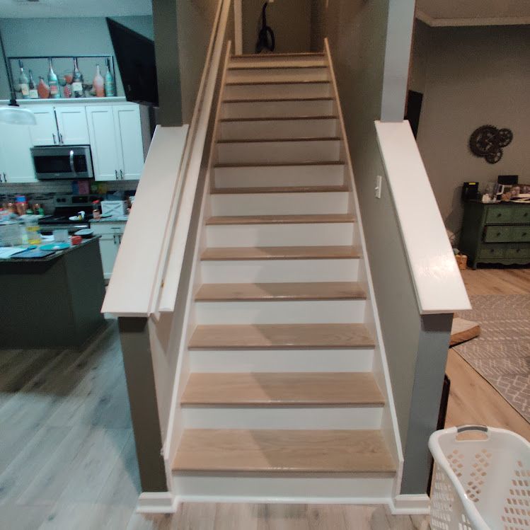 A staircase leading up to the second floor of a house