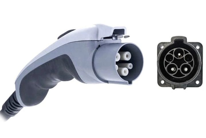 Gray and white EV charging connector and port.
