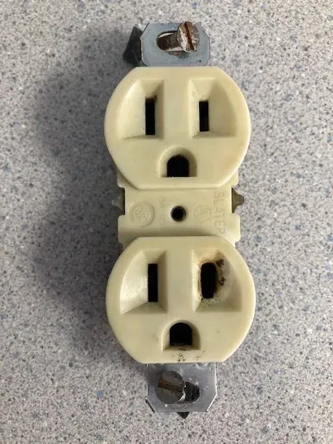 The beginnings of a problem! The lower right opening with signs of overheating.
