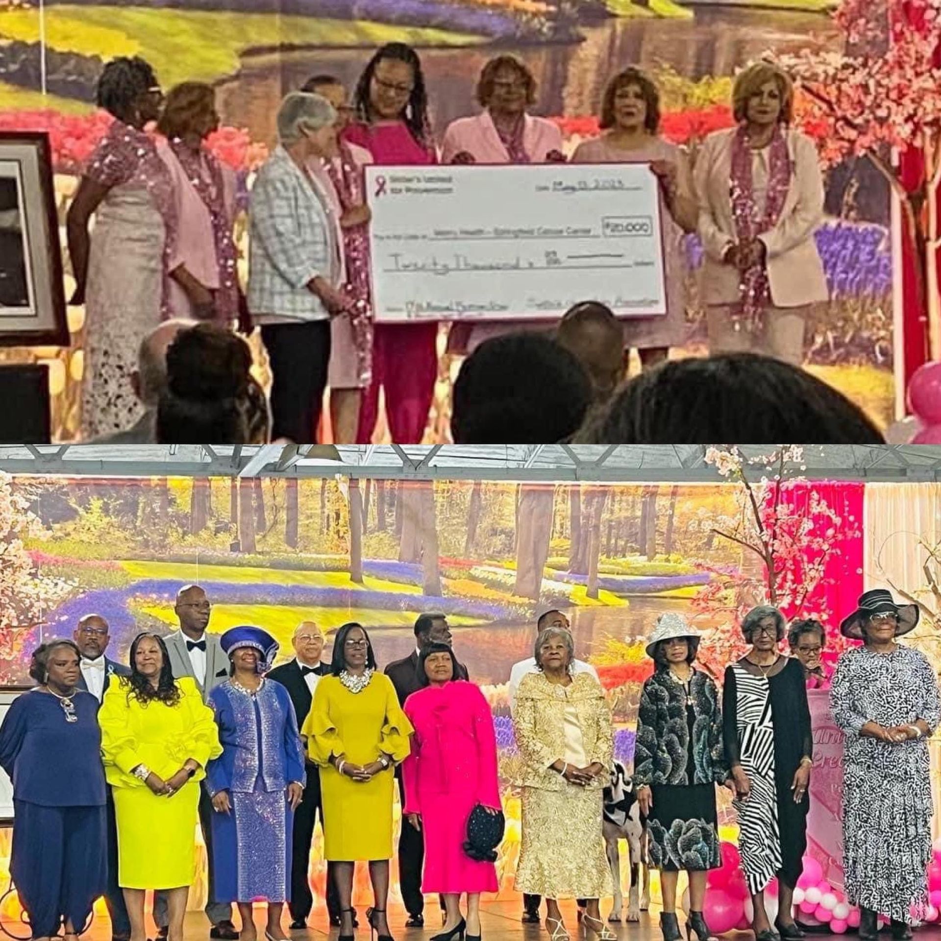 A group of people standing on a stage holding a large check