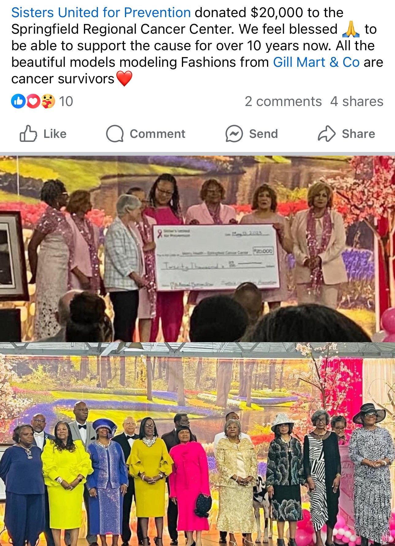 A group of women standing next to each other holding a large check.