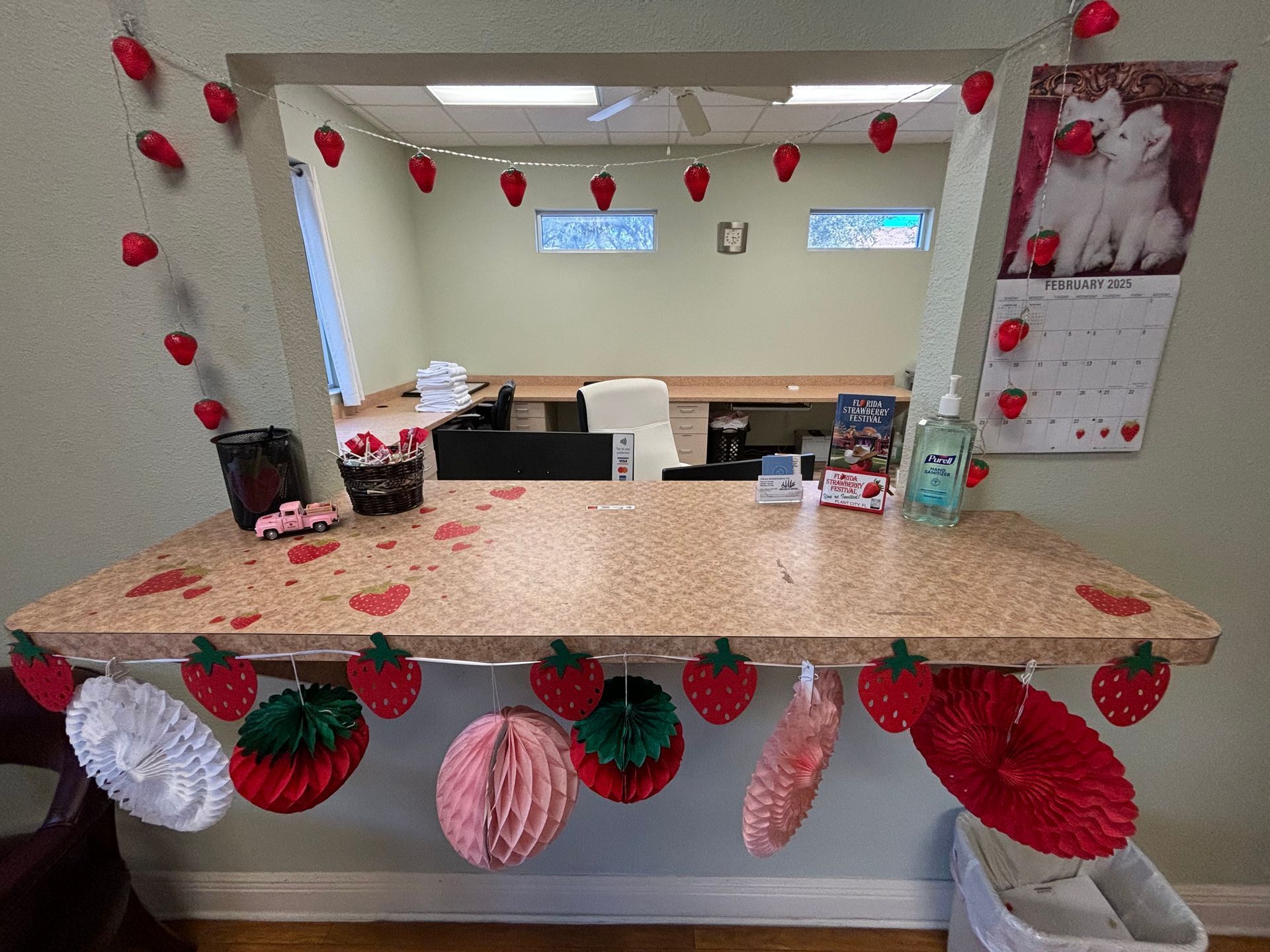 An office counter decorated with strawberries