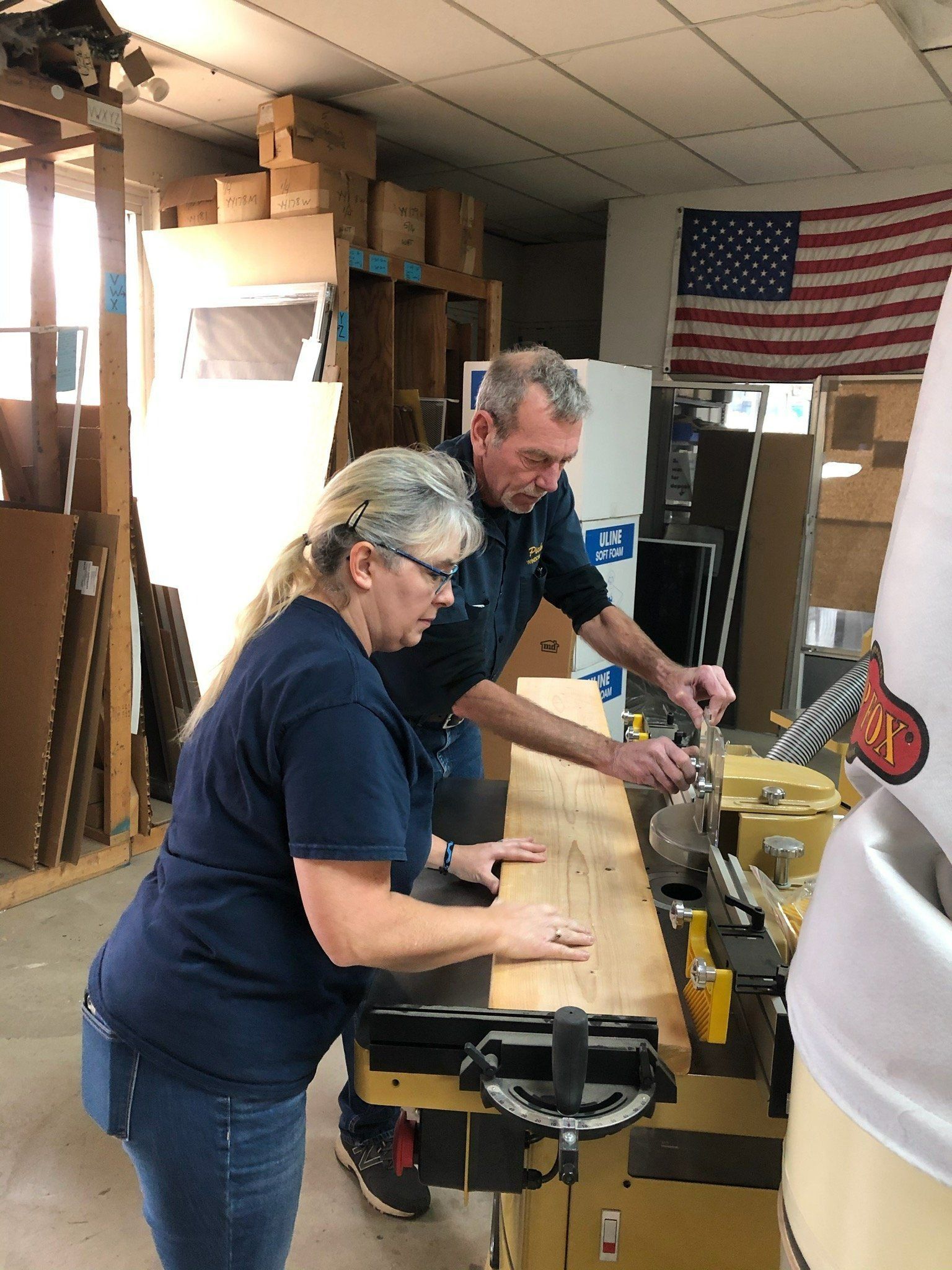 Staff restoring queen ann sash