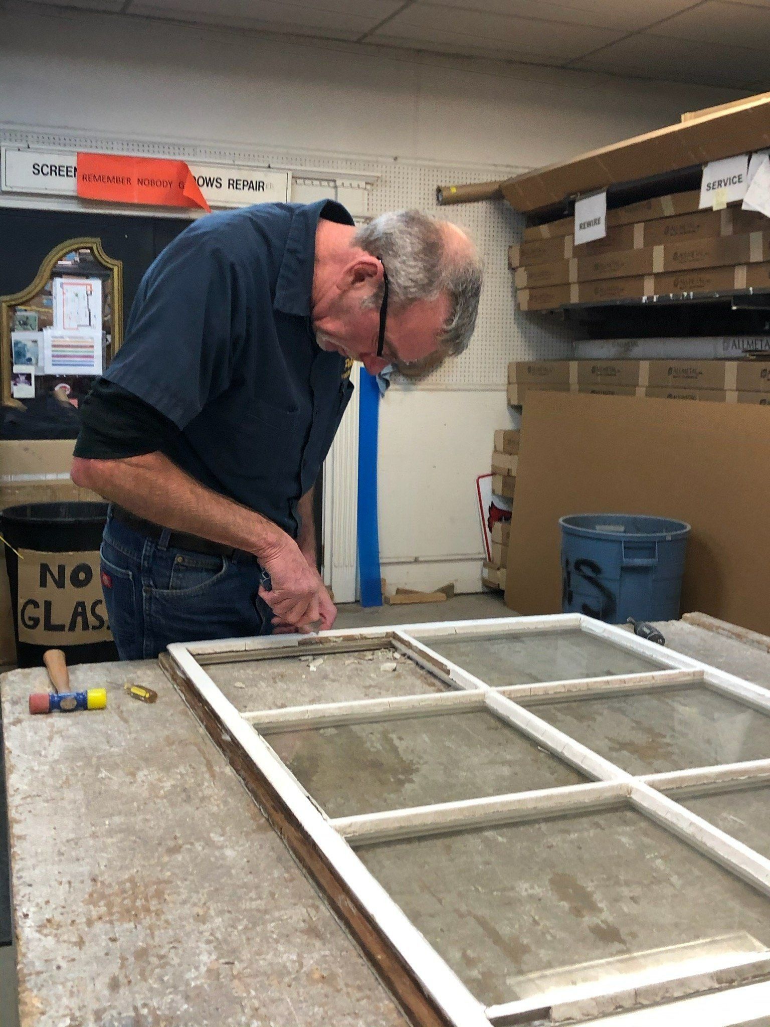 Staff restoring queen ann sash