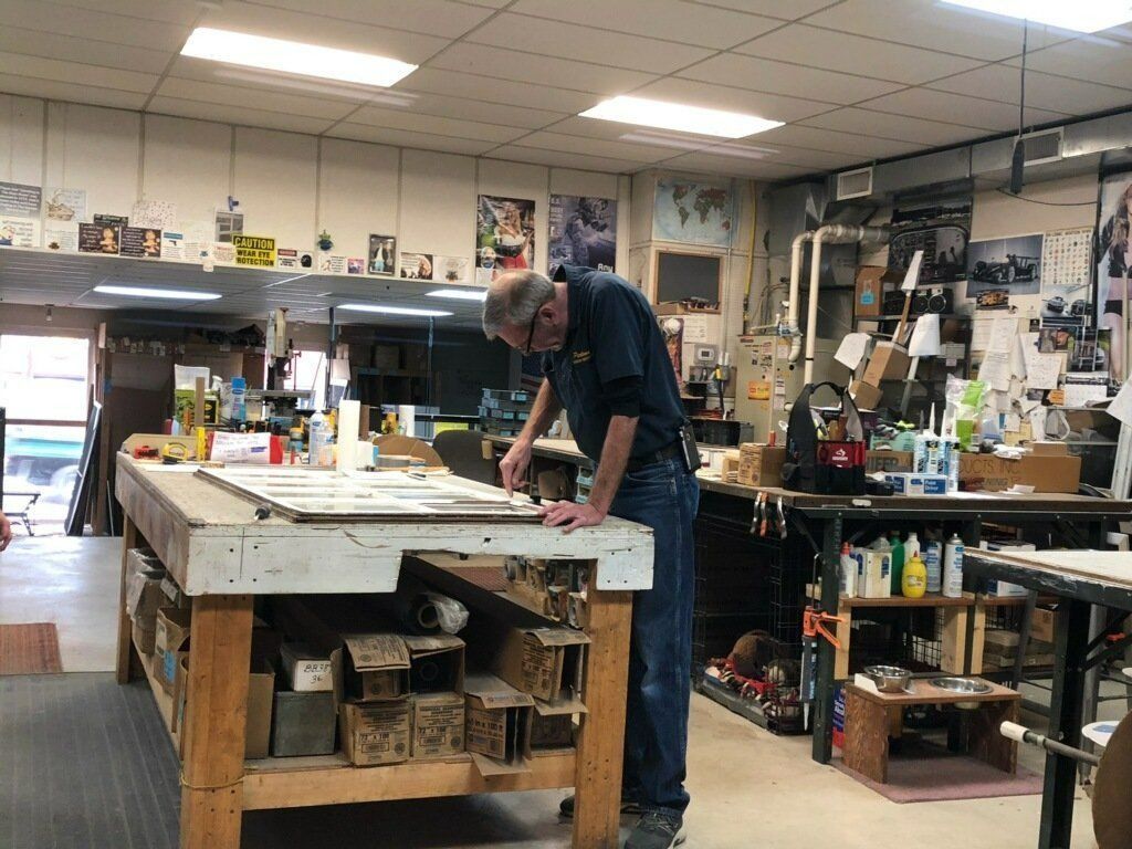 Staff restoring queen ann sash