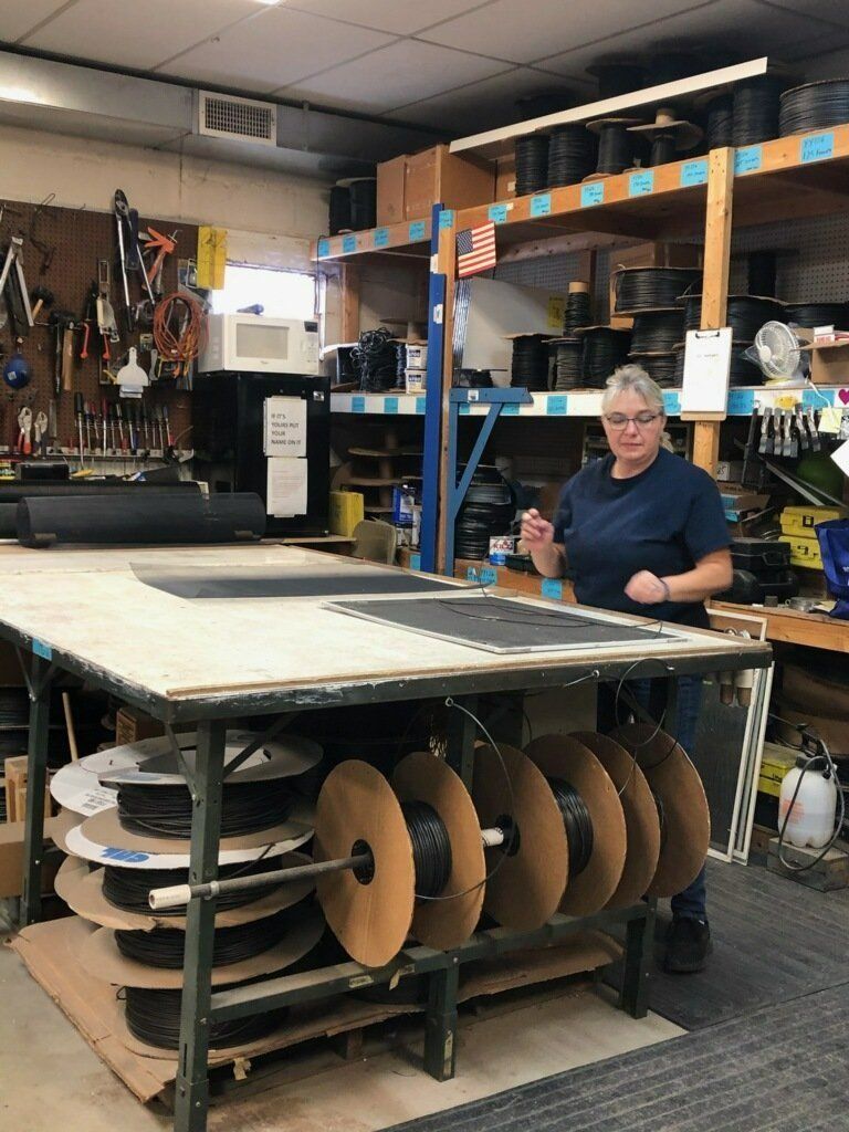 Staff restoring queen ann sash