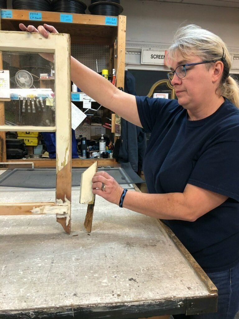 Staff restoring queen ann sash