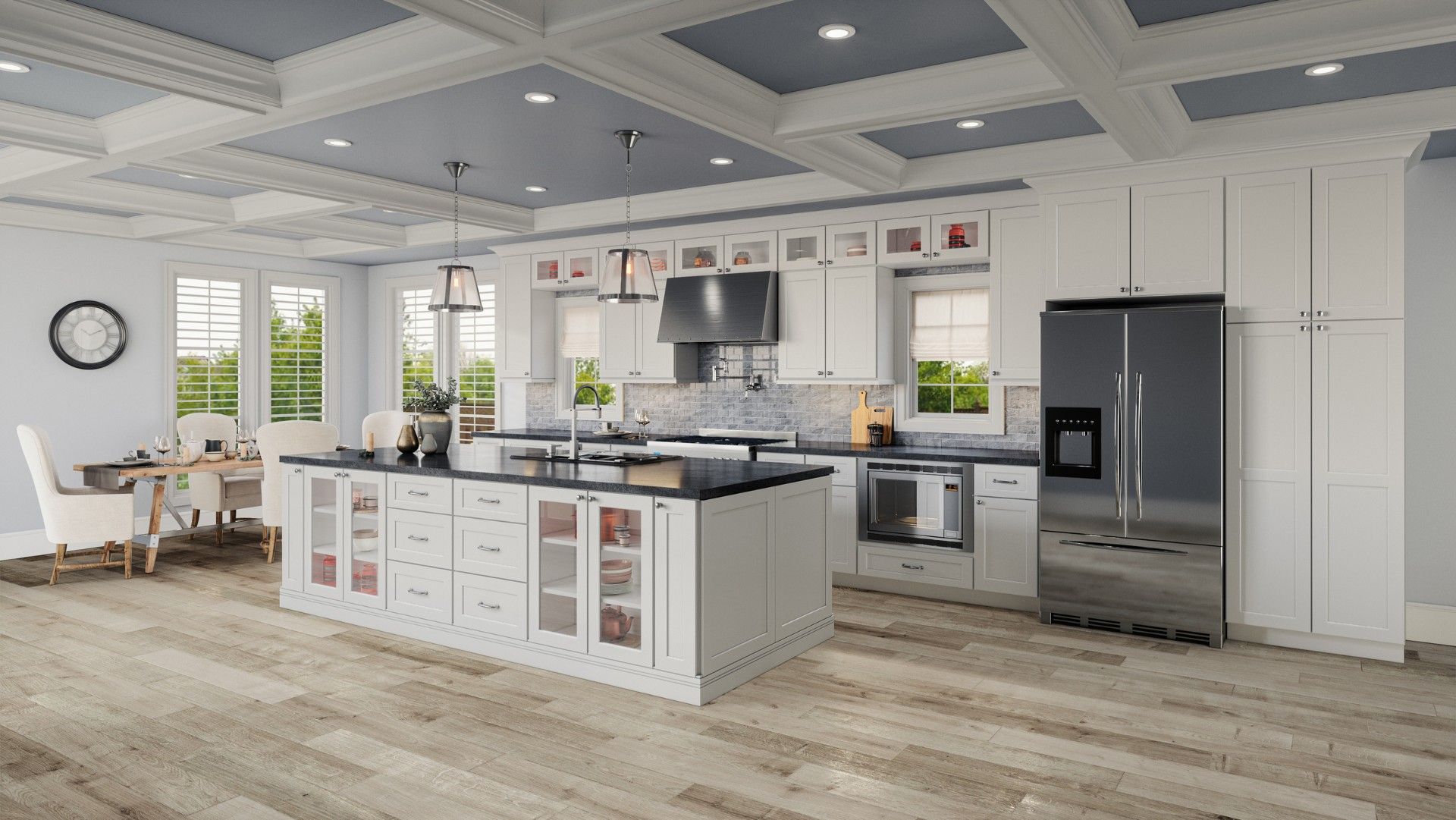 Bright modern kitchen with white cabinets, gray island, stainless appliances, and wood floors