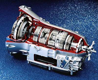 Cutaway view of a metallic jet engine with red casing on a blue background