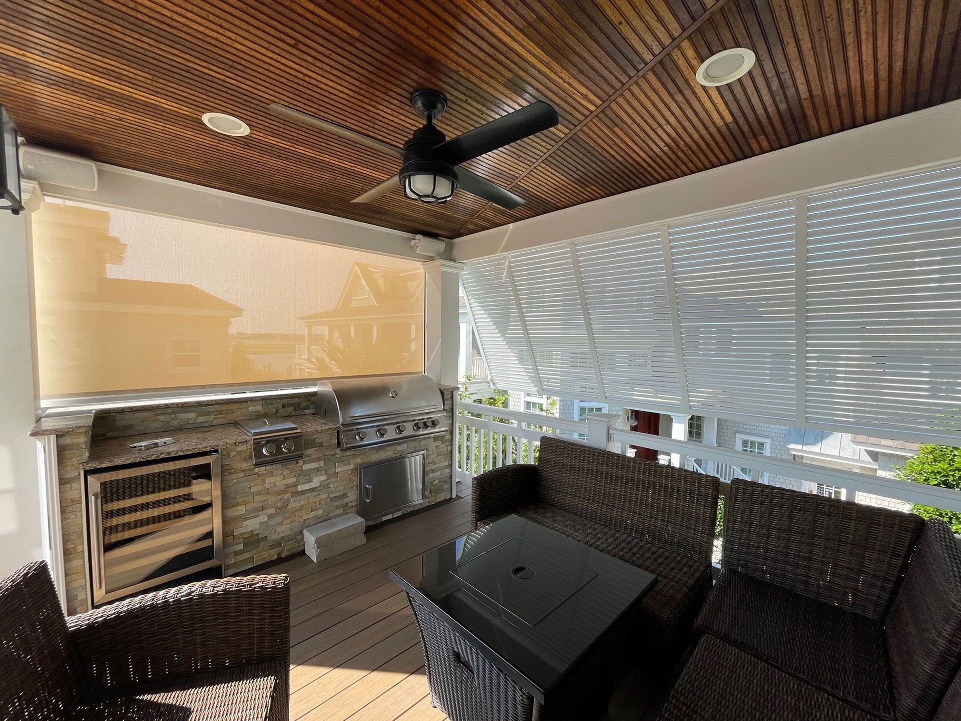 patio deck with grill and shutters