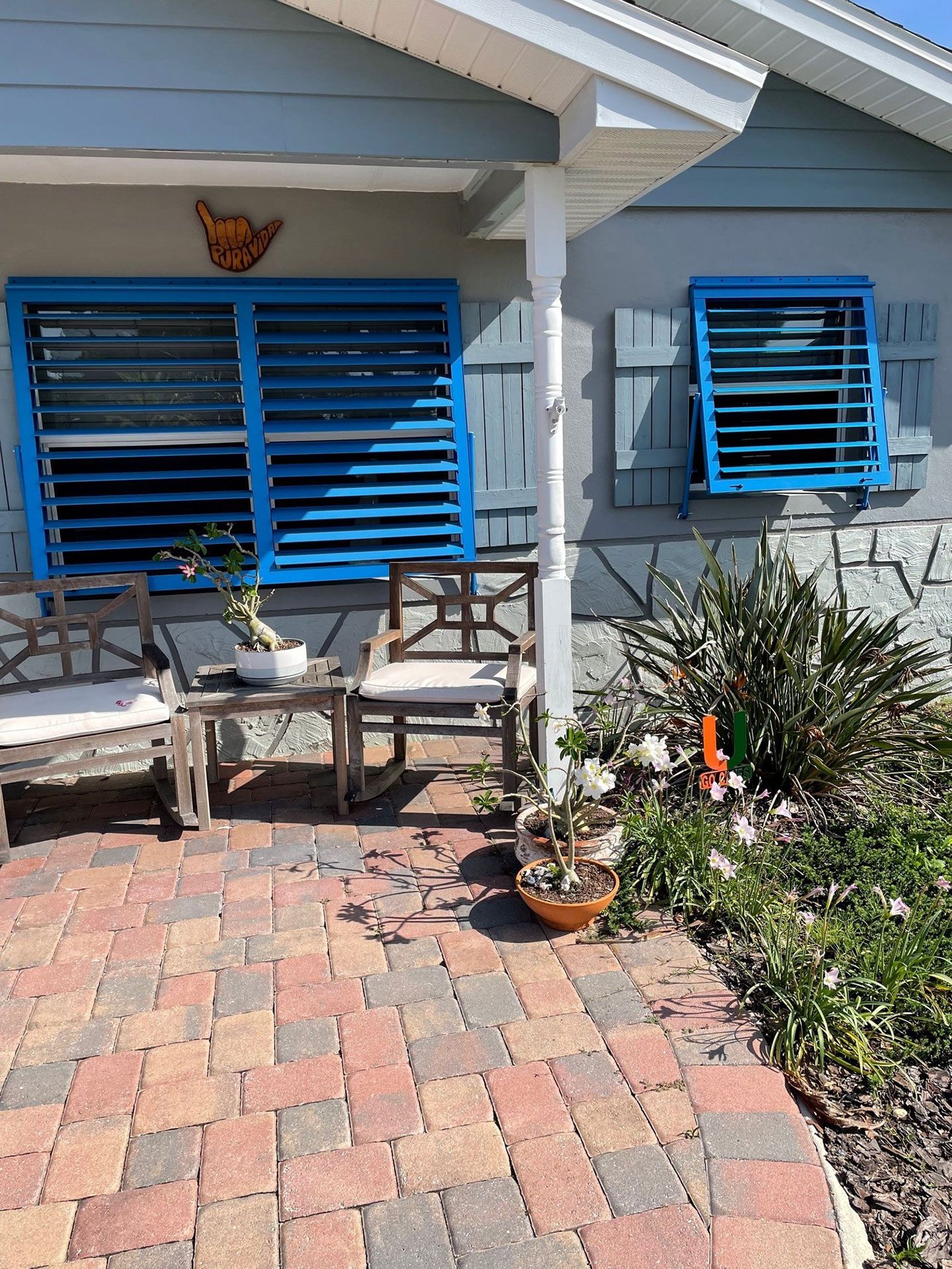 bungalow with blue shutters
