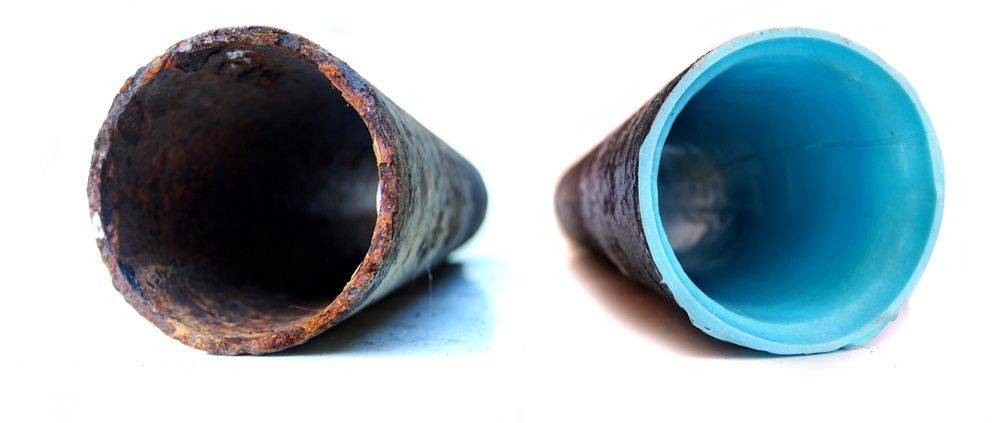 A side-by-side comparison of a corroded metal pipe and a metal pipe lined with a smooth, bright blue material.