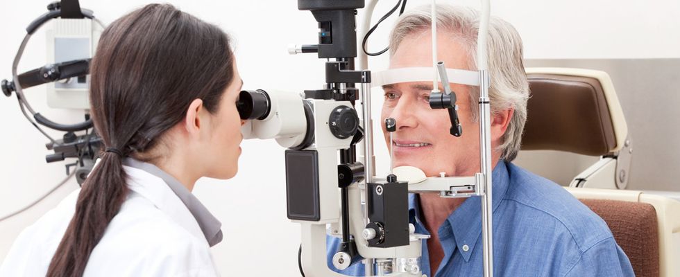 eye doctor performing an eye examination for her patient