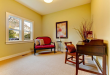 Spacious yellow room.