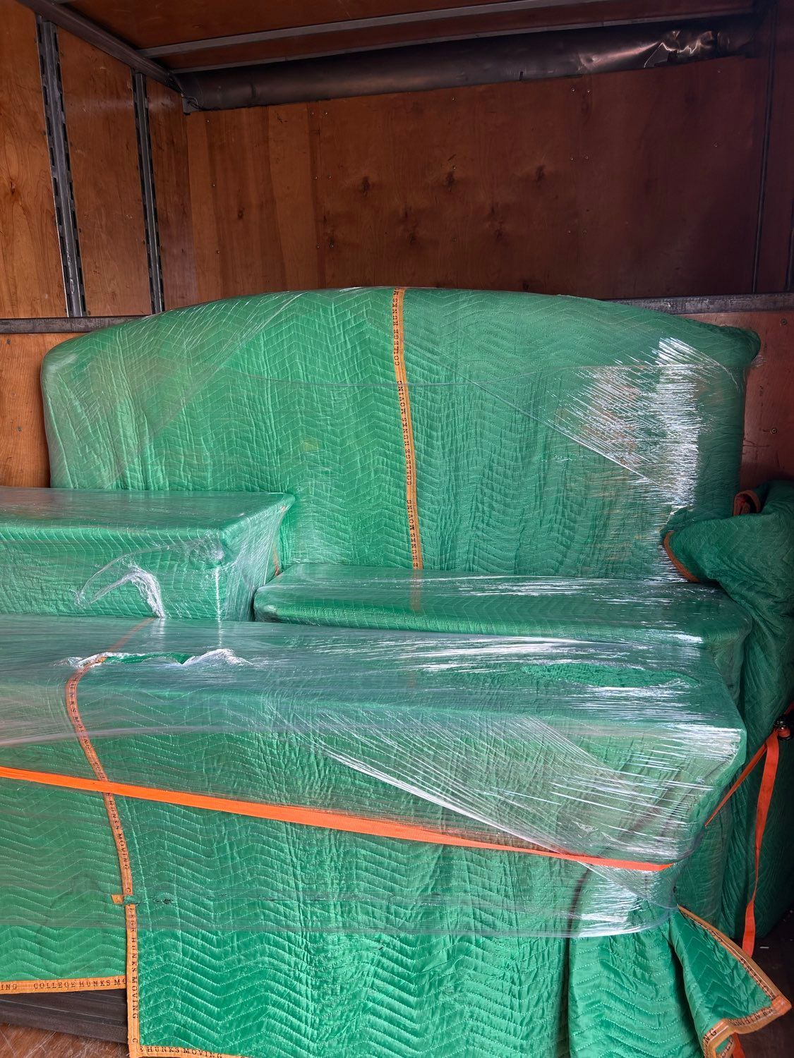 Green plastic-wrapped furniture