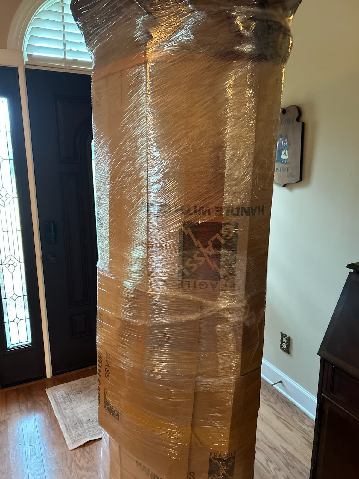 Tall cardboard-wrapped package