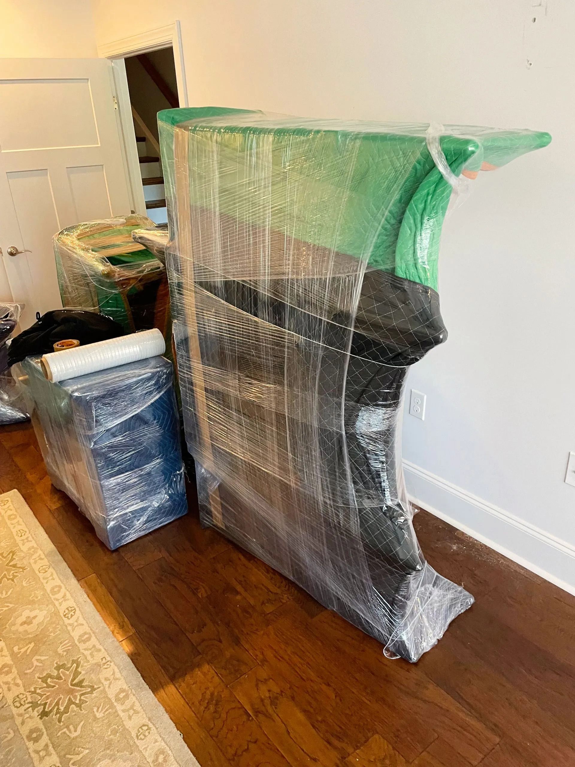Wrapped furniture pieces inside a home