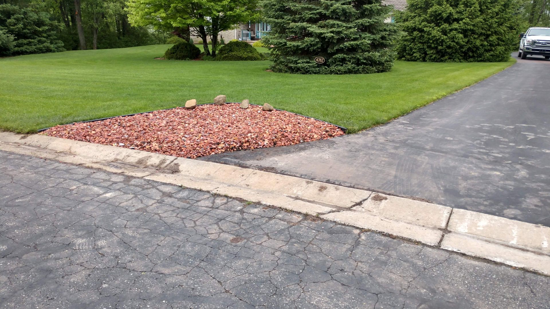 Stones at driveway edge