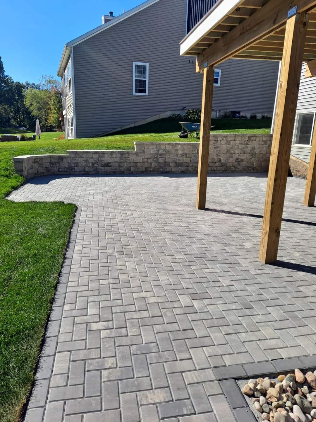 House with patio and wall