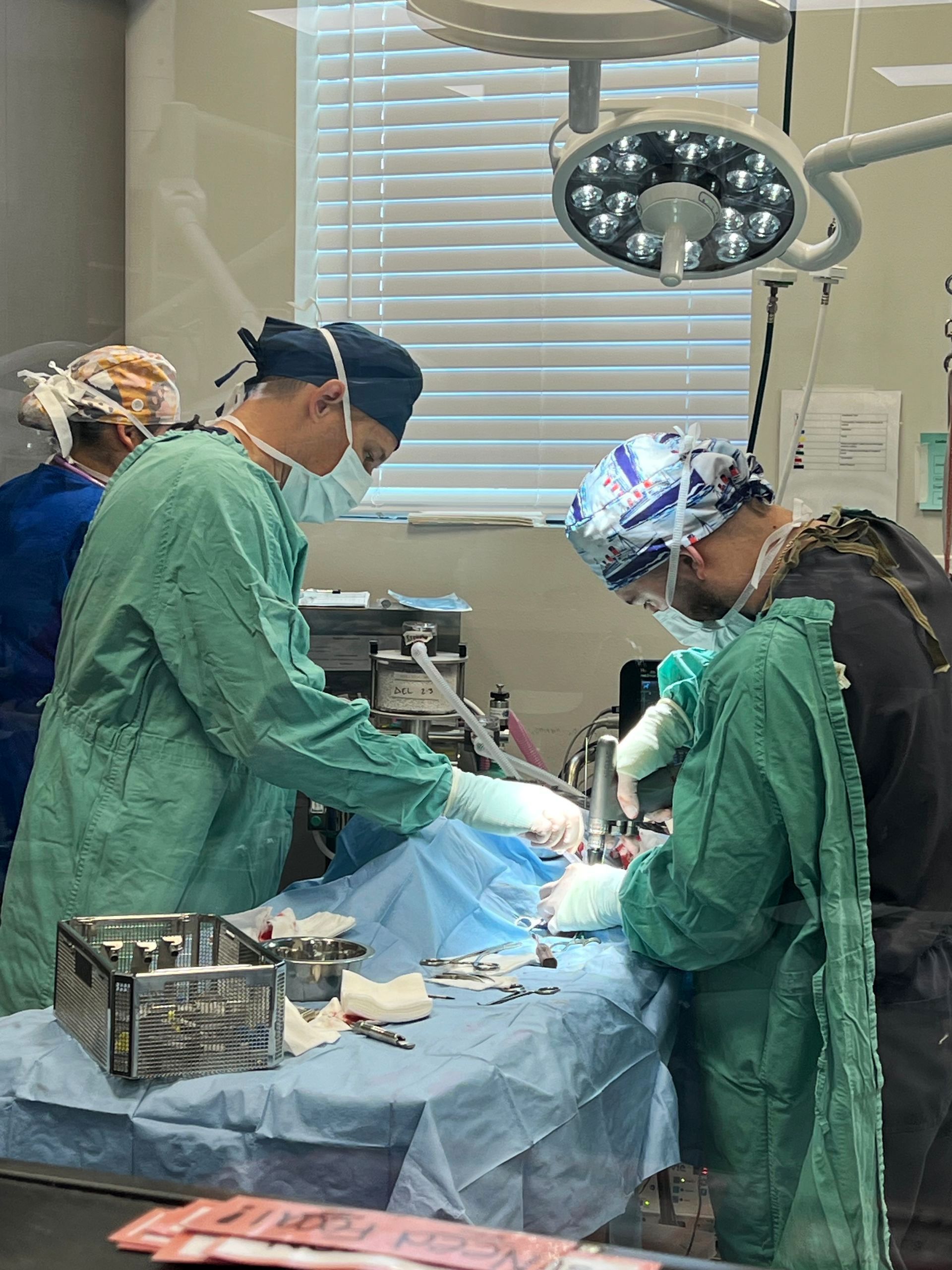 Medical team performing surgery in an operating room