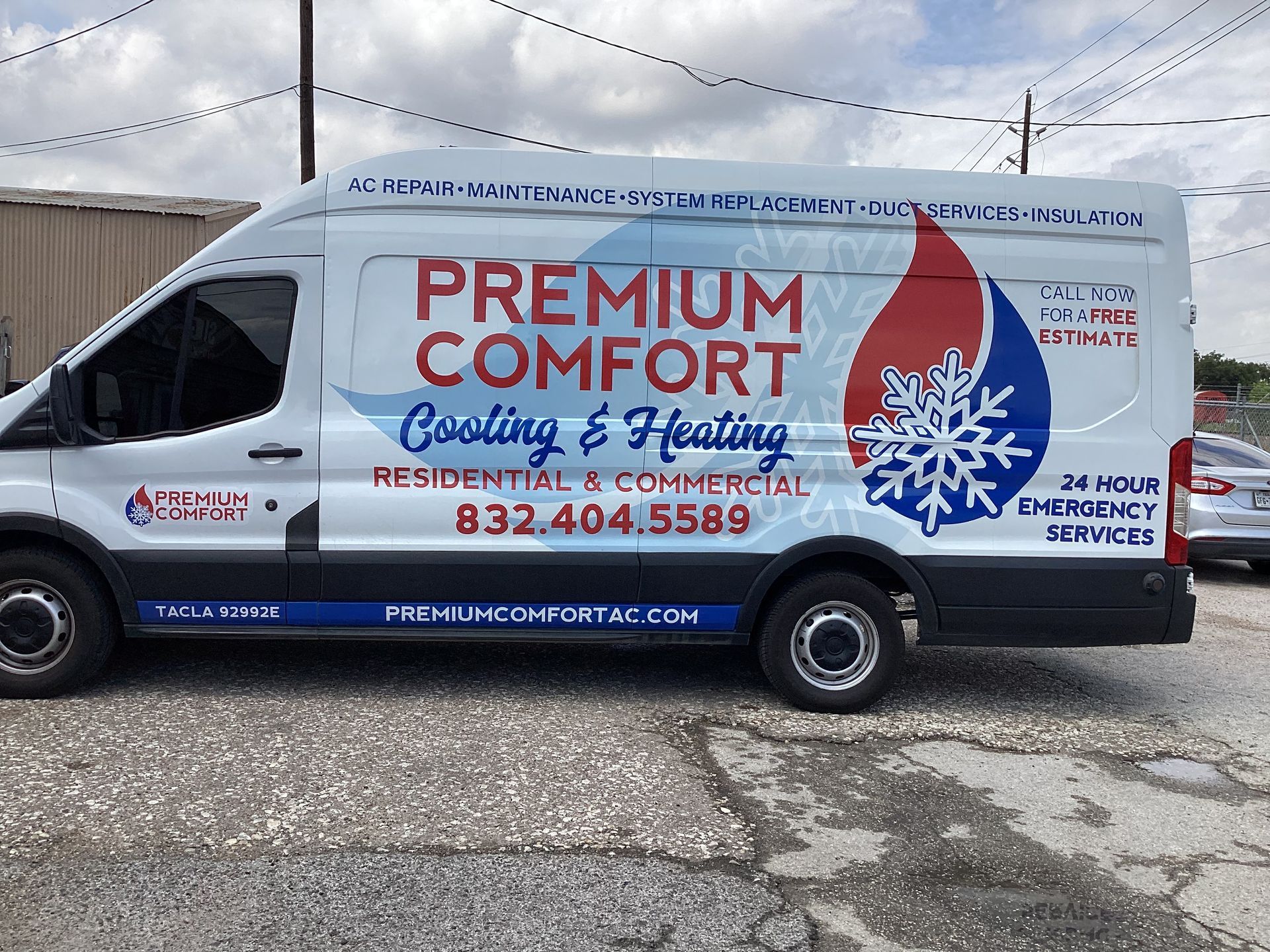 White Premium Comfort van with logo, parked outside. Cooling & Heating service, phone number visible.