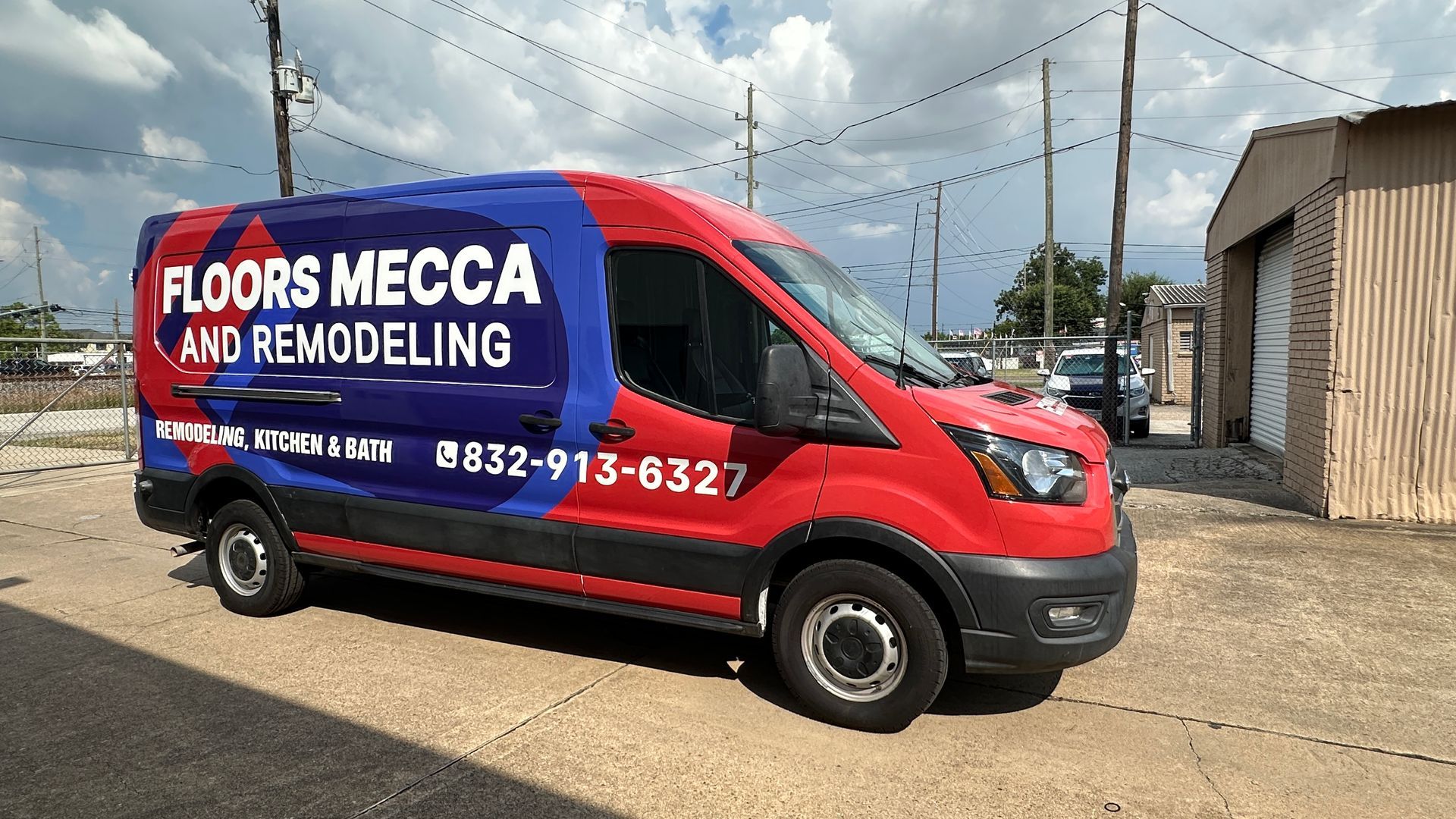 Red and blue Floors Mecca and Remodeling van parked on a street; phone number 832-913-8327 on side.